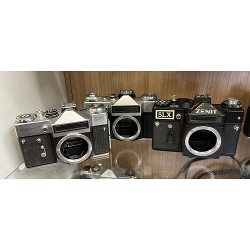 362 - TWO SHELVES OF ZENIT AND PRAKTICA 35M CAMERA BODIES