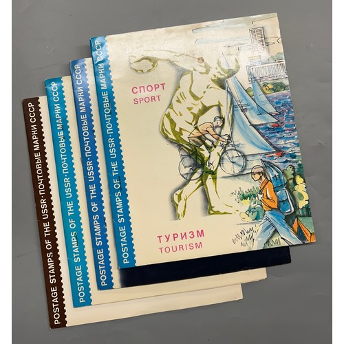 422 - FOLDER OF POSTAGE STAMP ALBUMS MAINLY CCCP