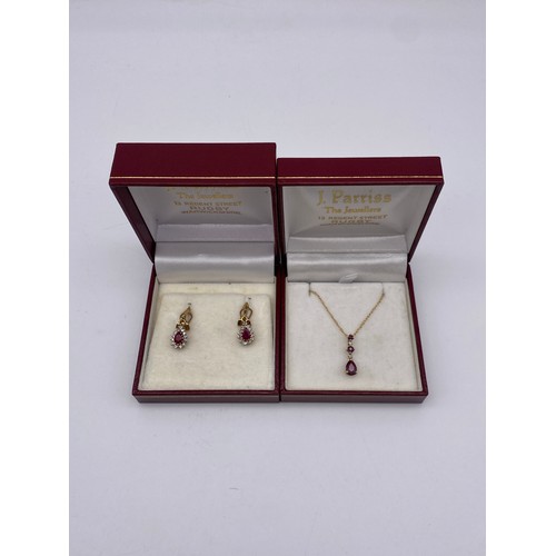 546 - 9CT GOLD RUBY CLUSTER AND CZ EARRINGS AND PENDANT ON TRACE CHAIN 3.8G APPROX