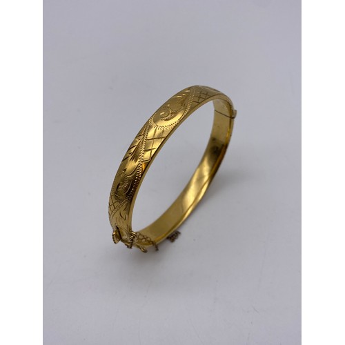 545 - ROLLED GOLD ENGRAVED BANGLE WITH BROKEN SAFETY CHAIN 14G APPROX