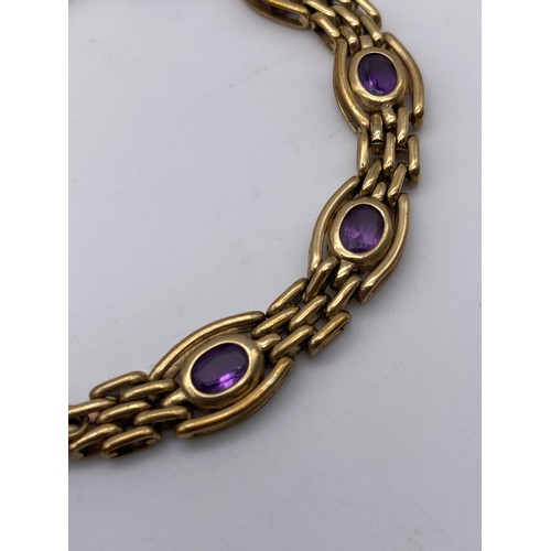 542 - 9CT GOLD GATE BRACELET WITH AMETHYST SET LINKS PADLOCK AND SAFETY CHAIN 19.8G APPROX