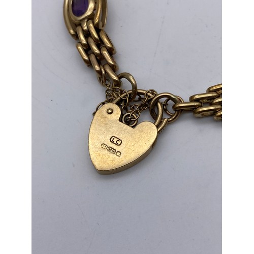 542 - 9CT GOLD GATE BRACELET WITH AMETHYST SET LINKS PADLOCK AND SAFETY CHAIN 19.8G APPROX