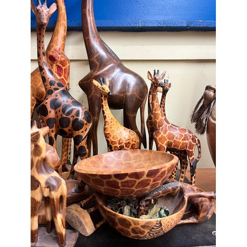 224 - SELECTION OF CARVED WOODEN AND POLISHED GIRAFFE FIGURES AND BOWLS