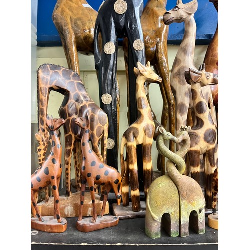 224 - SELECTION OF CARVED WOODEN AND POLISHED GIRAFFE FIGURES AND BOWLS