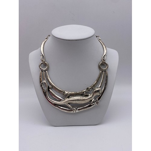 447 - METALWORK LIZARD AND DRAGONFLY NECKLACES AND AN ABSTRACT OPENWORK PENDANT