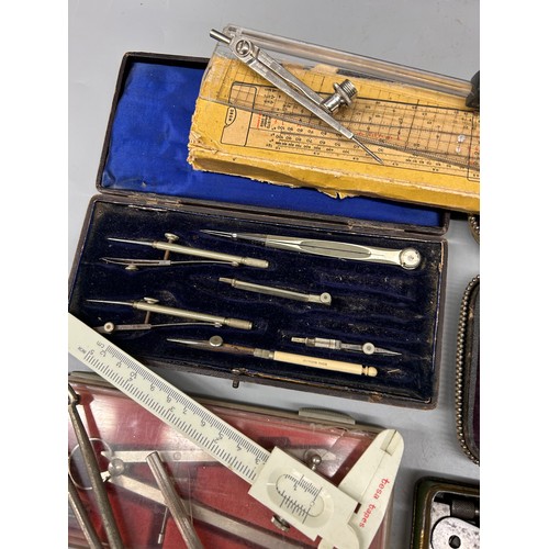 393 - BOX CONTAINING VARIOUS RULERS, PATH FINDER COMPASS, VINTAGE TECHNICAL DRAWING SET