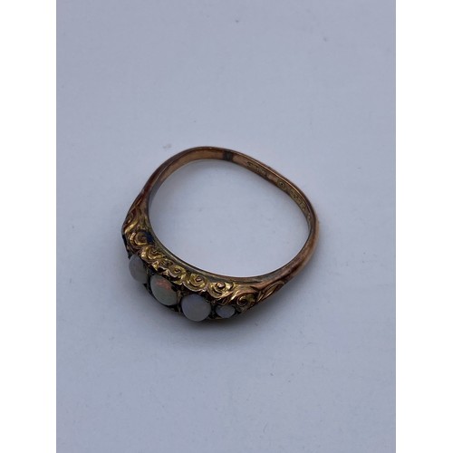 554 - 9CT GOLD FIVE STONE OPAL RING (ONE STONE MISSING & SHANK MISSHAPEN) 1.6G APPROX