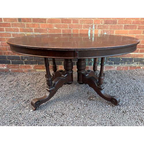 22 - 19TH CENTURY OVAL OAK EXTENDING DINING TABLE