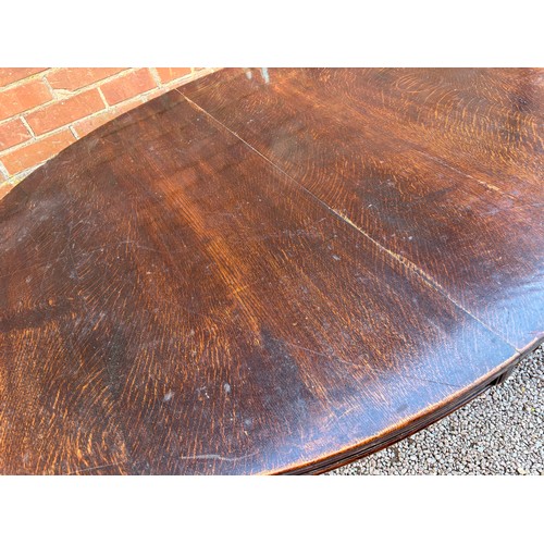 22 - 19TH CENTURY OVAL OAK EXTENDING DINING TABLE