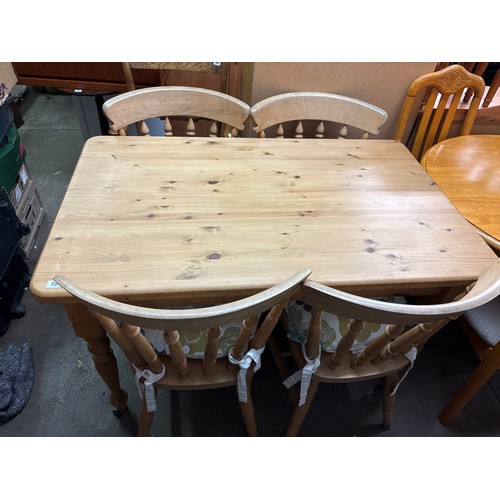 72 - PINE FARMHOUSE STYLE KITCHEN TABLE AND FOUR SPINDLE BACK CHAIRS