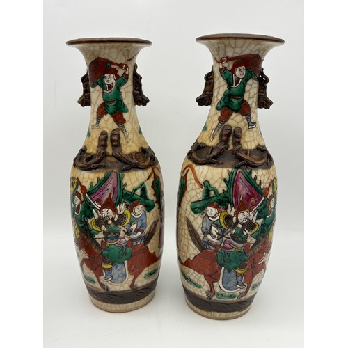 525 - PAIR OF EARLY 20TH CENTURY CRACKLE GLAZE BALUSTER VASES DECORATED WITH WARRIORS AND A BALUSTER VASE ... 