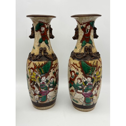 525 - PAIR OF EARLY 20TH CENTURY CRACKLE GLAZE BALUSTER VASES DECORATED WITH WARRIORS AND A BALUSTER VASE ... 