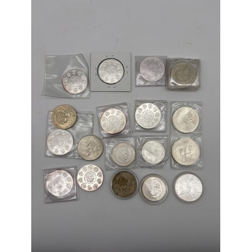 486 - MEXICAN FINE SILVER LEY COINS, MEXICAN ONE ONZA COINS, TWO ONE OUNCE PESO COINS, AND OTHERS