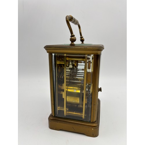 581 - FRENCH LACQUERED BRASS CASED CARRIAGE CLOCK THE ENAMEL DIAL RETAILED BY CURTIS AND SPRIGGS PARIS