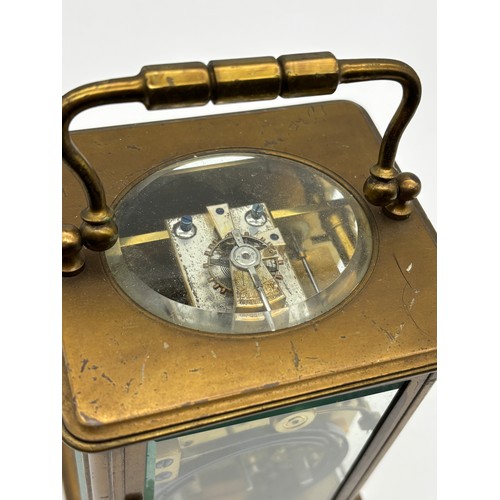 581 - FRENCH LACQUERED BRASS CASED CARRIAGE CLOCK THE ENAMEL DIAL RETAILED BY CURTIS AND SPRIGGS PARIS