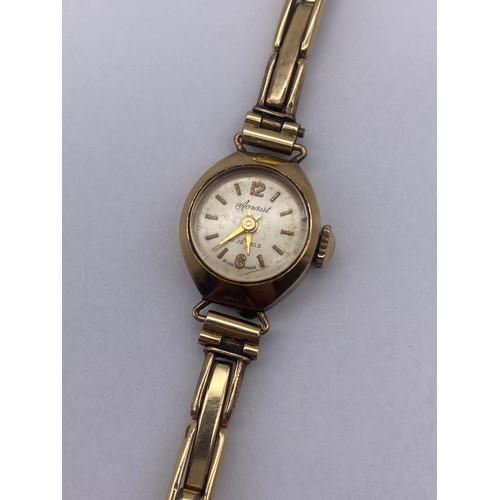 476 - LADIES 9CT GOLD CASED ACCURIST WRISTWATCH ON EXPANDING 9CT CORE BRACELET STRAP