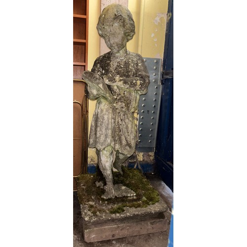 122B - WEATHERED COMPOSITE STONE GARDEN STATUE OF A GIRL READING ON SQUARE SECTION BASE