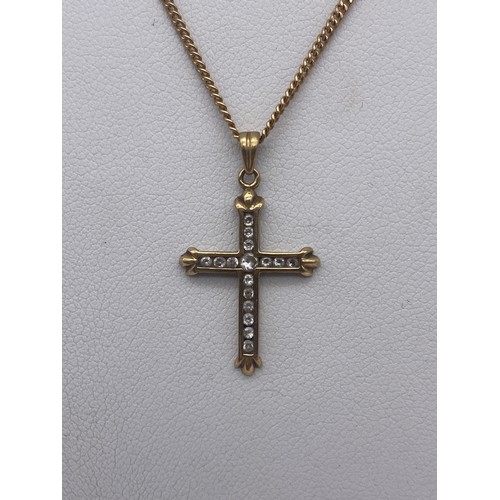 463 - 9CT GOLD CROSS ON A 9K TRACE CHAIN 3.1G APPROX