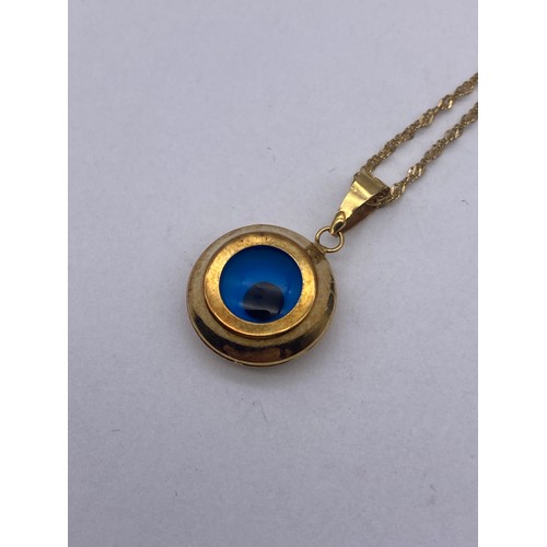 437 - STAMPED 585 EYE PENDANT ON FINE 14K TRACE CHAIN 2.7G APPROX OVERALL