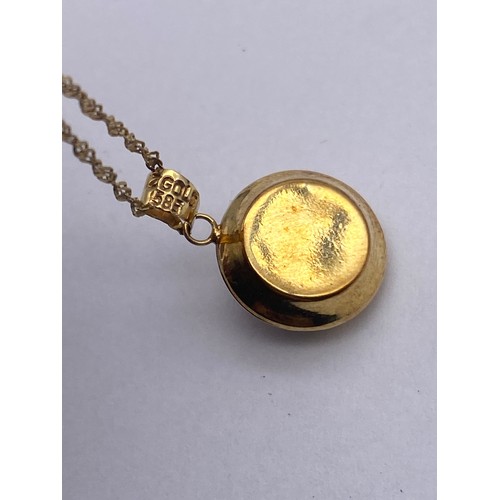 437 - STAMPED 585 EYE PENDANT ON FINE 14K TRACE CHAIN 2.7G APPROX OVERALL