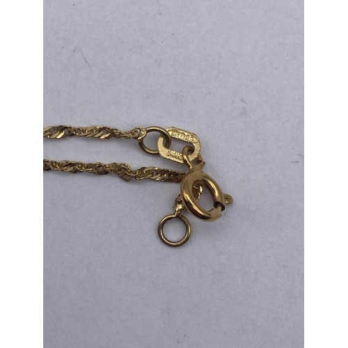 437 - STAMPED 585 EYE PENDANT ON FINE 14K TRACE CHAIN 2.7G APPROX OVERALL