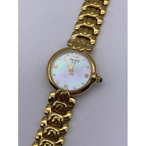 446 - LADIES TISSOT GOLD PLATED WRISTWATCH WITH MOTHER OF PEARL DIAL