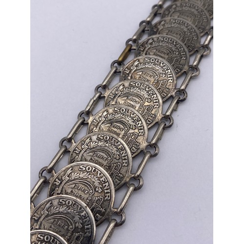 443 - WHITE METAL SOUVENIR COIN BRACELET