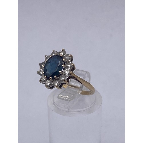 433 - TWO 9CT GOLD BLUE STONE CLUSTER DRESS RINGS 4.8G APPROX SIZES N & M (ONE WITH DIAMONDS AND ONE WITH ... 