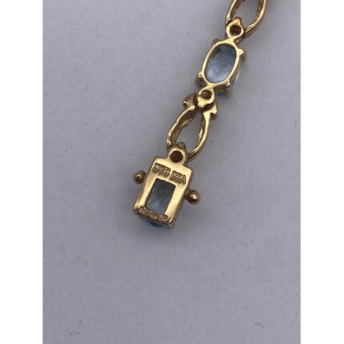 461 - 9CT GOLD TOPAZ PENDANT ON FINE TRACE CHAIN AND 9CT GOLD TOPAZ TENNIS BRACELET 9.3G OVERALL APPROX