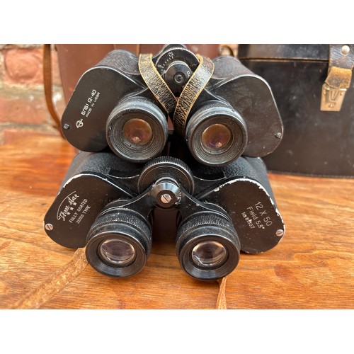 569 - PAIR OF USSR 12X40 BINOCULARS AND A PAIR OF THREE STAR ZEISS TYPE BINOCULARS 12X50