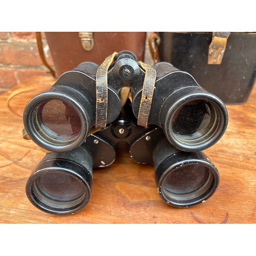 569 - PAIR OF USSR 12X40 BINOCULARS AND A PAIR OF THREE STAR ZEISS TYPE BINOCULARS 12X50