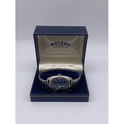 469 - BOXED GENTS ROTARY STAINLESS STEEL WRISTWATCH AND AN ACCURIST 21 JEWEL DAY DATE WRISTWATCH