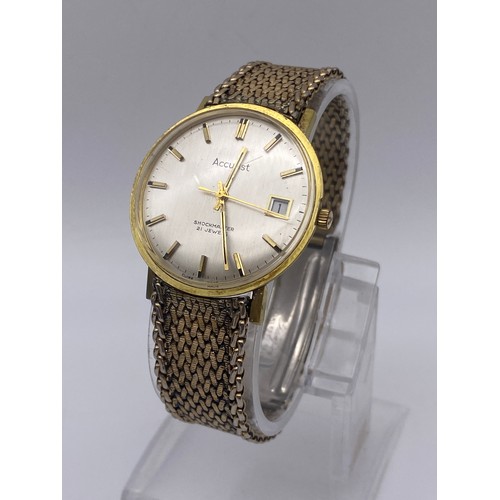 469 - BOXED GENTS ROTARY STAINLESS STEEL WRISTWATCH AND AN ACCURIST 21 JEWEL DAY DATE WRISTWATCH