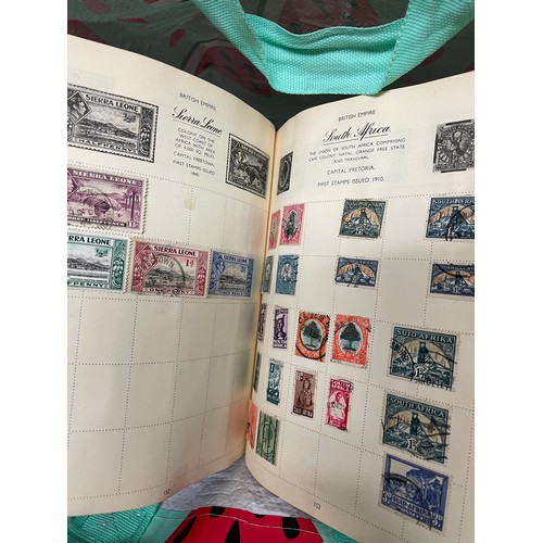 517 - THREE LARGE ALBUMS OF GB AND CHANNEL ISLANDS POSTAGE STAMPS, WORLD ALBUM AND OTHERS