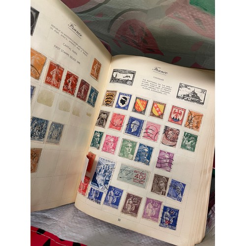 517 - THREE LARGE ALBUMS OF GB AND CHANNEL ISLANDS POSTAGE STAMPS, WORLD ALBUM AND OTHERS