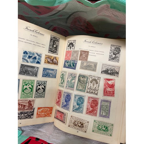 517 - THREE LARGE ALBUMS OF GB AND CHANNEL ISLANDS POSTAGE STAMPS, WORLD ALBUM AND OTHERS