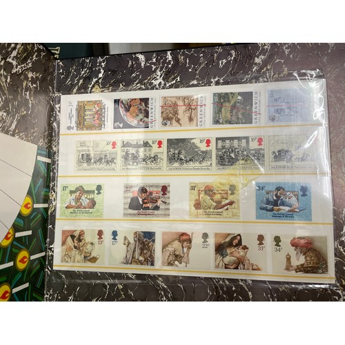 517 - THREE LARGE ALBUMS OF GB AND CHANNEL ISLANDS POSTAGE STAMPS, WORLD ALBUM AND OTHERS