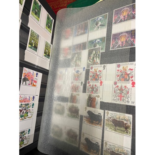 517 - THREE LARGE ALBUMS OF GB AND CHANNEL ISLANDS POSTAGE STAMPS, WORLD ALBUM AND OTHERS