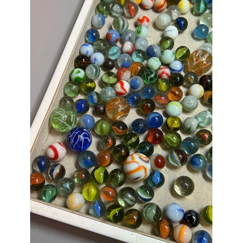 585 - SACK OF VARIOUS GLASS MARBLES