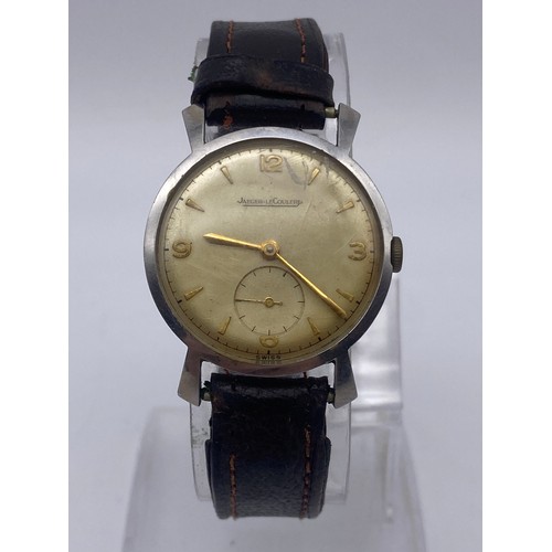 579 - BOXED JAEGER LECOULTRE VINTAGE STAINLESS STEEL WRISTWATCH ON LEATHER STRAP CIRCA 1950 A/F