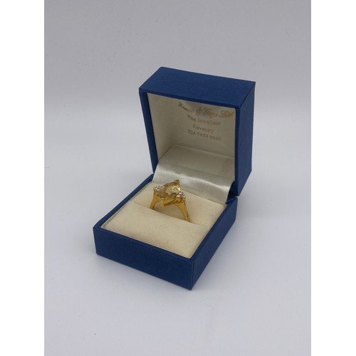 632 - 750/18CT MARQUISE CITRINE AND DIAMOND RING SIZE M 5.7G