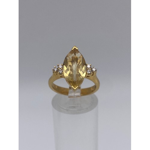 632 - 750/18CT MARQUISE CITRINE AND DIAMOND RING SIZE M 5.7G