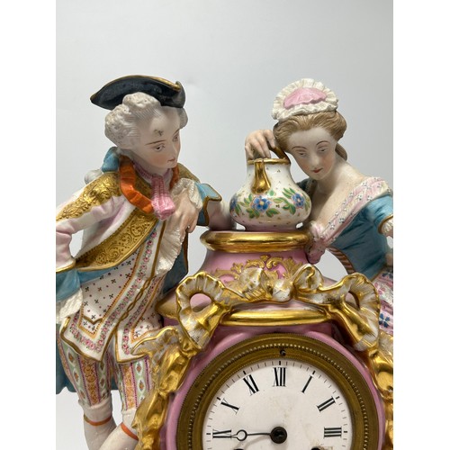 573 - CONTINENTAL PORCELAIN FIGURAL AND GILT DECORATED CLOCK