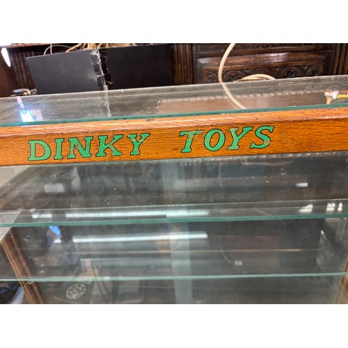 135 - GLAZED THREE SHELF SHOP DINKY TOYS DISPLAY CASE WITH SLIDING DOORS