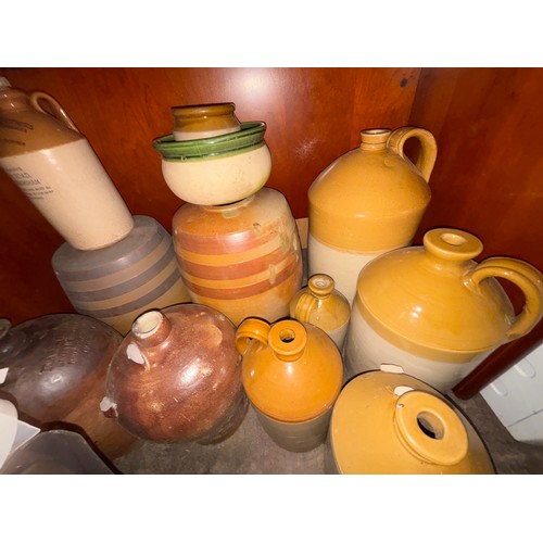 75 - SELECTION OF STONEWARE FLAGONS AND BANDED BARRELS