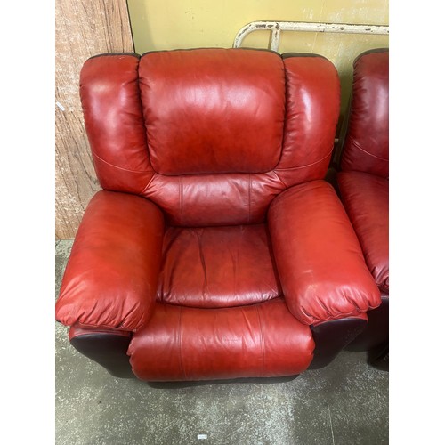 50 - PAIR OF RED LEATHER ELECTRIC RISER CHAIRS