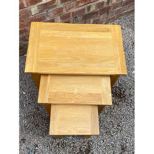 52 - NEST OF LIGHT OAK TABLES