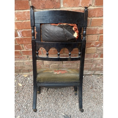 43A - VICTORIAN EBONISED NURSING CHAIR
