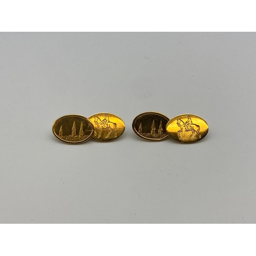 642 - STAMPED 750 18CT OVAL CUFFLINKS ENGRAVED WITH THE THREE SPIRES AND LADY GODIVA 13.8G APPROX