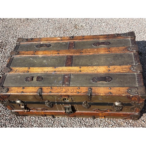 29 - GOOD QUALITY BANDED CANVAS CABIN TRUNK